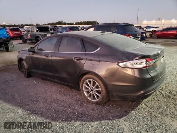 ✅ 2017 Ford Fusion SE • VIN: 3FA6P0H79HR143215 • Lot: 91162535. Wystawiony na Copart z przebiegiem 130 490 mil. Bezpłatny archiwum sprzedaży aukcyjnych z USA i szczegółowy raport historii pojazdu na DreamBid. Zdjęcie 2.