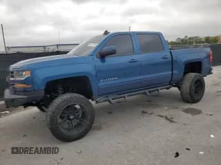 2018 Chevrolet Silverado 1500 LT с VIN 3GCUKREC5JG217656, выставлен на аукционе Copart как лот 86154185 с пробегом 110 664 миль миль и Списание • Salvage title. История ставок и продаж доступна на DreamBid. Изображение 1.