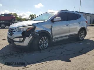 ✅ 2015 Hyundai Santa Fe • VIN: 5XYZU3LA3FG282803 • Lot: 82160215. Listed on Copart with 85,391 mi. Free auction sales archive from the USA and detailed vehicle history report at DreamBid. Image 1.