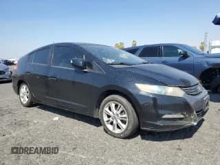 ✅ 2010 Honda Insight EX • VIN: JHMZE2H78AS015498 • Лот: 71292474. Опубликован ранее на Copart с пробегом 233 287 миль. Бесплатный доступ к архиву аукционных продаж из США и подробный отчёт об истории автомобиля на DreamBid. Изображение 4.