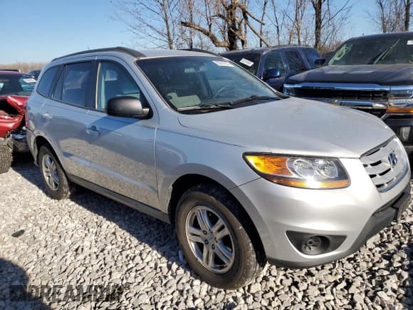 ✅ 2011 Hyundai Santa Fe GLS • VIN: 5XYZGDAG9BG019617 • Lot: 82813104. Listed on Copart with 183,683 mi. Free auction sales archive from the USA and detailed vehicle history report at DreamBid. Image 4.