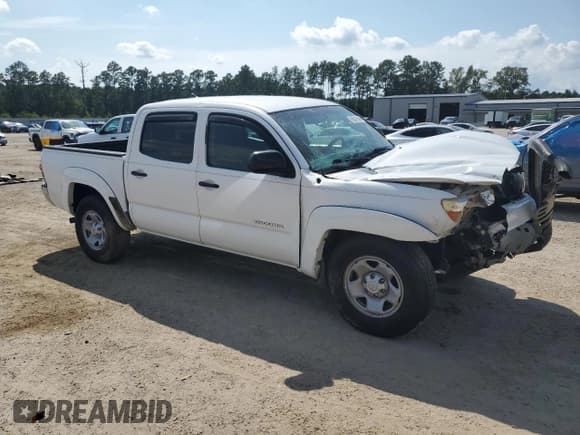✅ 2015 Toyota Tacoma PreRunner • VIN: 3TMJU4GN6FM179474 • Lot: 69581945. Listed on Copart with 211,078 mi. Free auction sales archive from the USA and detailed vehicle history report at DreamBid. Image 4.