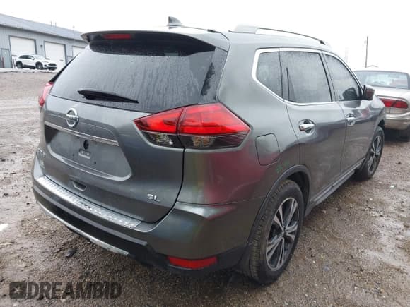 ✅ 2017 Nissan Rogue SL • VIN: 5N1AT2MT9HC747002 • Lot: 42284884. Listed on IAAI with 107,061 mi. Free auction sales archive from the USA and detailed vehicle history report at DreamBid. Image 4.