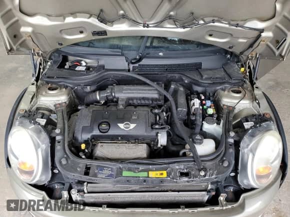 2010 MINI Hardtop with VIN WMWMF3C50ATZ66791, listed as a Copart auction lot 57592875 with Not provided miles and Salvage title. Bid and sale history available at DreamBid. Image 12.