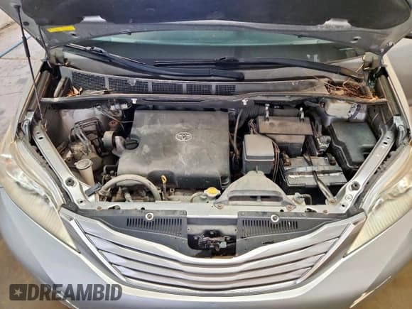 ✅ 2016 Toyota Sienna LE • VIN: 5TDKK3DC2GS739046 • Lot: 92675785. Listed on Copart with 53,997 mi. Free auction sales archive from the USA and detailed vehicle history report at DreamBid. Image 12.