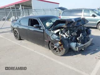 ✅ 2007 Dodge Charger SRT-8 • VIN: 2B3LA73W67H667309 • Лот: 43224102. Опубликован ранее на IAAI с пробегом 133 661 миль. Бесплатный доступ к архиву аукционных продаж из США и подробный отчёт об истории автомобиля на DreamBid. Изображение 1.