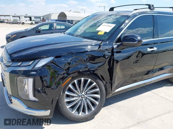 2023 Hyundai Palisade Calligraphy с VIN KM8R74GE2PU561164, выставлен на аукционе IAAI как лот 43333582 с пробегом 55 914 миль миль и . История ставок и продаж доступна на DreamBid. Изображение 6.