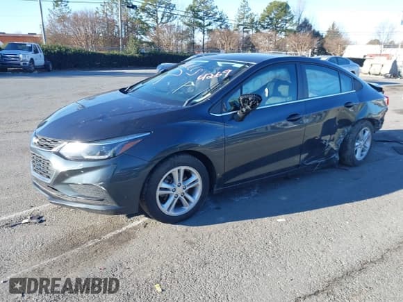 ✅ 2018 Chevrolet Cruze LT • VIN: 1G1BE5SM3J7124269 • Lot: 41749217. Listed on IAAI with 129,483 mi. Free auction sales archive from the USA and detailed vehicle history report at DreamBid. Image 2.