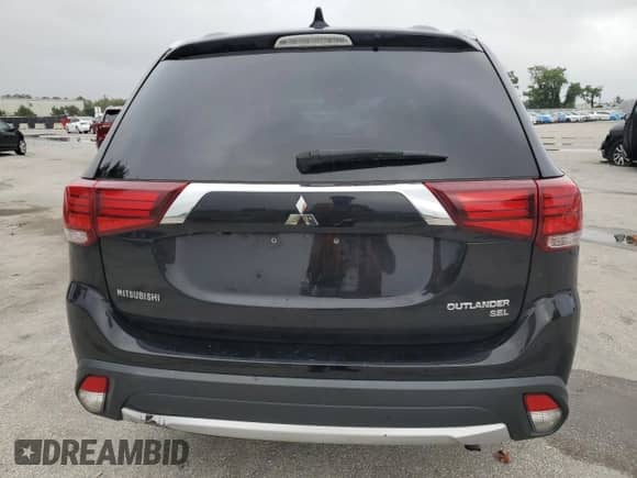 2017 Mitsubishi Outlander SE с VIN JA4AD3A38HZ005774, выставлен на аукционе Copart как лот 82360745 с пробегом 137 158 миль миль и Списание • Salvage title. История ставок и продаж доступна на DreamBid. Изображение 6.