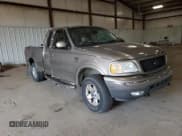 ✅ 2003 Ford F-150 XL • VIN: 1FTRX18L33NB70593 • Lot: 59683265. Listed on Copart with 200,854 mi. Free auction sales archive from the USA and detailed vehicle history report at DreamBid. Image 4.