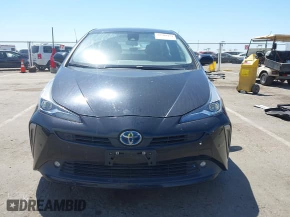✅ 2021 Toyota Prius LE • VIN: JTDL9MFUXM3024282 • Lot: 42304474. Listed on IAAI with 67,019 mi. Free auction sales archive from the USA and detailed vehicle history report at DreamBid. Image 12.
