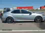 2021 Toyota Camry Hybrid SE z VIN 4T1G31AKXMU562641, wystawiony jako IAAI lot #42415712 z przebiegiem 71 085 mil mil oraz . Historia ofert i sprzedaży dostępna na DreamBid. Obrazek 13.