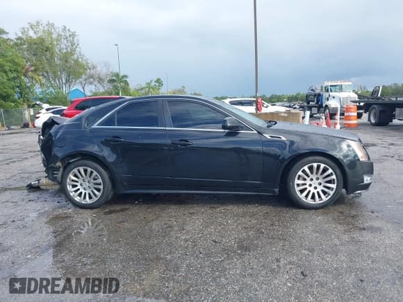 ✅ 2012 Cadillac CTS Premium • VIN: 1G6DP5E30C0146497 • Lot: 43841827. Listed on IAAI with 82,703 mi. Free auction sales archive from the USA and detailed vehicle history report at DreamBid. Image 13.