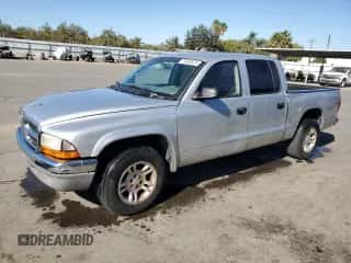 2004 Dodge Dakota SLT z VIN 1D7HL48N54S750432, wystawiony jako Copart lot #78485624 z przebiegiem 139 073 mil mil oraz Czysty tytuł • Clean title. Historia ofert i sprzedaży dostępna na DreamBid. Obrazek 1.