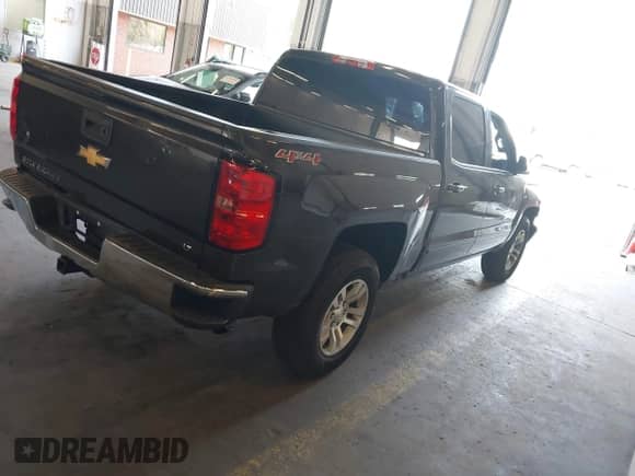 2016 Chevrolet Silverado 1500 LT with VIN 3GCUKREC6GG129840, listed as a IAAI auction lot 43088052 with 123,184 mi miles and . Bid and sale history available at DreamBid. Image 4.