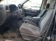 ✅ 2005 GMC Envoy SLE • VIN: 1GKDS13S652105835 • Лот: 67188425. Опубликован ранее на Copart с пробегом 176 614 миль. Бесплатный доступ к архиву аукционных продаж из США и подробный отчёт об истории автомобиля на DreamBid. Изображение 7.