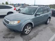 ✅ 2009 Subaru Forester X • VIN: JF2SH63619H744761 • Lot: 42036101. Listed on IAAI with 154,353 mi. Free auction sales archive from the USA and detailed vehicle history report at DreamBid. Image 2.