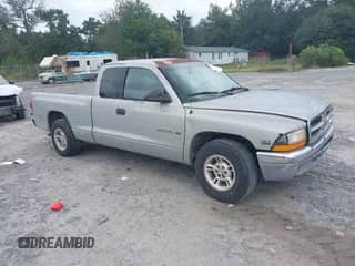 1998 Dodge Dakota SLT with VIN 1B7GL22X2WS677463, listed as a IAAI auction lot 43185225 with 218,259 mi miles and . Bid and sale history available at DreamBid. Image 1.
