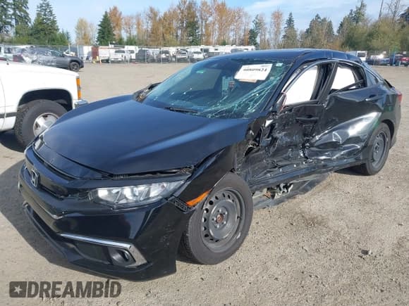 ✅ 2021 Honda Civic LX • VIN: 2HGFC2F66MH517914 • Lot: 40809824. Listed on IAAI with Not provided. Free auction sales archive from the USA and detailed vehicle history report at DreamBid. Image 2.