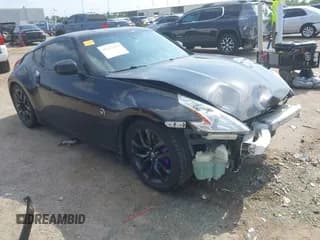 ✅ 2016 Nissan 370Z • VIN: JN1AZ4EH8GM931402 • Lot: 42273424. Listed on IAAI with 105,184 mi. Free auction sales archive from the USA and detailed vehicle history report at DreamBid. Image 1.