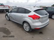 ✅ 2017 Ford Focus Titanium • VIN: 1FADP3N21HL287695 • Lot: 43504177. Listed on IAAI with 57,599 mi. Free auction sales archive from the USA and detailed vehicle history report at DreamBid. Image 3.