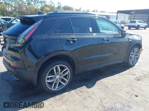✅ 2022 Cadillac XT4 FWD Sport • VIN: 1GYFZER45NF169304 • Lot: 43589404. Listed on IAAI with Not provided. Free auction sales archive from the USA and detailed vehicle history report at DreamBid. Image 4.
