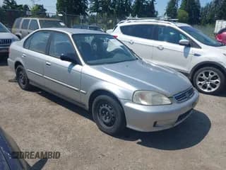 ✅ 1999 Honda Civic VP • VIN: 2HGEJ661XXH519490 • Lot: 42397513. Listed on IAAI with 128,415 mi. Free auction sales archive from the USA and detailed vehicle history report at DreamBid. Image 1.