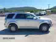 2010 Mercury Mariner Premier z VIN 4M2CN9HGXAKJ16116, wystawiony jako IAAI lot #43140056 z przebiegiem 194 370 mil mil oraz . Historia ofert i sprzedaży dostępna na DreamBid. Obrazek 14.