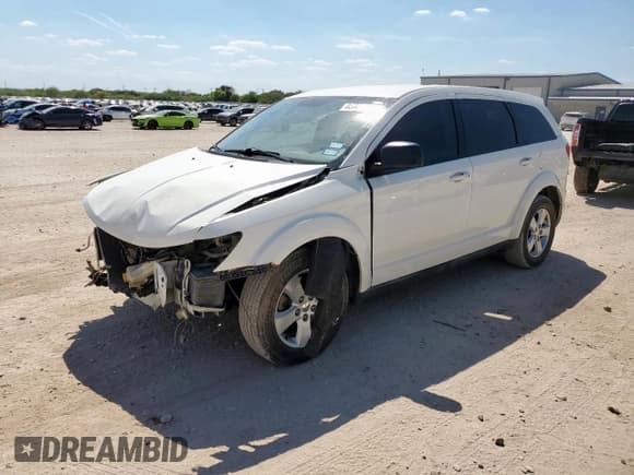 ✅ 2013 Dodge Journey SE • VIN: 3C4PDCABXDT566955 • Lot: 83923985. Listed on Copart with 211,219 mi. Free auction sales archive from the USA and detailed vehicle history report at DreamBid. Image 1.