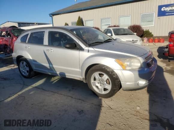 2009 Dodge Caliber SXT с VIN 1B3HB48A19D259377, выставлен на аукционе Copart как лот 82244864 с пробегом 157 358 миль миль и Списание • Salvage title. История ставок и продаж доступна на DreamBid. Изображение 4.