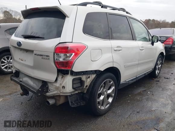 ✅ 2015 Subaru Forester Touring • VIN: JF2SJAWC9FH582396 • Лот: 43702787. Опубликован ранее на IAAI с пробегом 130 365 миль. Бесплатный доступ к архиву аукционных продаж из США и подробный отчёт об истории автомобиля на DreamBid. Изображение 4.