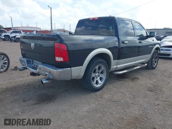 ✅ 2009 Dodge 1500 Laramie • VIN: 1D3HB13T29S778382 • Lot: 42456475. Wystawiony na IAAI z przebiegiem 229 669 mil. Bezpłatny archiwum sprzedaży aukcyjnych z USA i szczegółowy raport historii pojazdu na DreamBid. Zdjęcie 4.