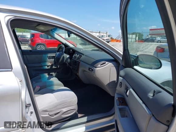 ✅ 2003 Mercury Sable GS • VIN: 1MEFM50213A611357 • Lot: 42142256. Listed on IAAI with 170,396 mi. Free auction sales archive from the USA and detailed vehicle history report at DreamBid. Image 5.