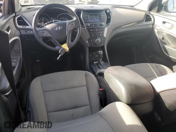 ✅ 2017 Hyundai Santa Fe 2.4L • VIN: 5XYZTDLB8HG438824 • Lot: 93089465. Listed on Copart with 87,905 mi. Free auction sales archive from the USA and detailed vehicle history report at DreamBid. Image 8.