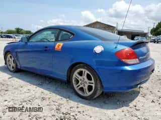 2005 Hyundai Tiburon GS с VIN KMHHM65DX5U168343, выставлен на аукционе Copart как лот 58749085 с пробегом Не указан миль и Чистый • Clean title. История ставок и продаж доступна на DreamBid. Изображение 2.