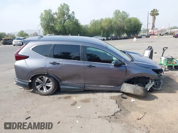 ✅ 2020 Honda CR-V LX • VIN: 7FARW1H23LE001347 • Лот: 42585044. Опубликован ранее на IAAI с пробегом 140 538 миль. Бесплатный доступ к архиву аукционных продаж из США и подробный отчёт об истории автомобиля на DreamBid. Изображение 13.