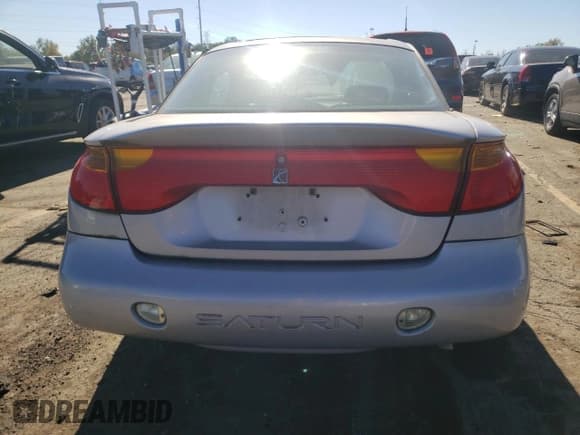 ✅ 2001 Saturn SC • VIN: 1G8ZY14751Z338353 • Лот: 75086154. Опубликован ранее на Copart с пробегом 100 044 миль. Бесплатный доступ к архиву аукционных продаж из США и подробный отчёт об истории автомобиля на DreamBid. Изображение 6.