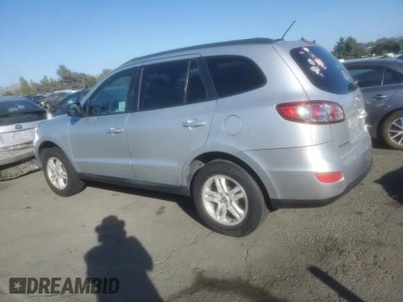 2012 Hyundai Santa Fe GLS with VIN 5XYZG3AB1CG123017, listed as a Copart auction lot 69345564 with 170,744 mi miles and Clean title. Bid and sale history available at DreamBid. Image 2.