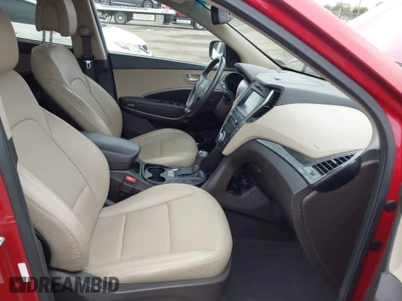 2017 Hyundai Santa Fe 2.4L z VIN 5XYZUDLB2HG385082, wystawiony jako IAAI lot #43416115 z przebiegiem Nie podano mil oraz . Historia ofert i sprzedaży dostępna na DreamBid. Obrazek 5.