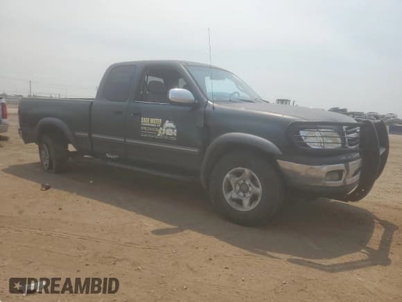 ✅ 2001 Toyota Tundra SR5 • VIN: 5TBBT44151S165351 • Lot: 66675025. Listed on Copart with 360,199 mi. Free auction sales archive from the USA and detailed vehicle history report at DreamBid. Image 4.