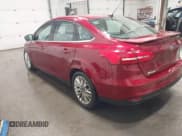 ✅ 2017 Ford Focus Titanium • VIN: 1FADP3J26HL238966 • Lot: 43818466. Listed on IAAI with 35,572 mi. Free auction sales archive from the USA and detailed vehicle history report at DreamBid. Image 3.