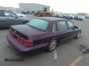 ✅ 1994 Lincoln Continental • VIN: 1LNLM9840RY602663 • Лот: 31711429. Опубликован ранее на IAAI с пробегом 90 889 миль. Бесплатный доступ к архиву аукционных продаж из США и подробный отчёт об истории автомобиля на DreamBid. Изображение 4.