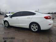 ✅ 2017 Chevrolet Cruze LT • VIN: 1G1BE5SM7H7104147 • Lot: 44147213. Listed on Copart with 150,598 mi. Free auction sales archive from the USA and detailed vehicle history report at DreamBid. Image 2.