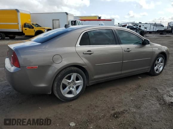 ✅ 2012 Chevrolet Malibu 1LS • VIN: 1G1ZB5E07CF185195 • Lot: 79741894. Listed on Copart with 126,140 mi. Free auction sales archive from the USA and detailed vehicle history report at DreamBid. Image 3.