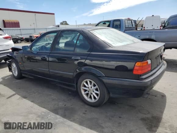 1998 BMW 3 Series z VIN WBACD3321WAV24693, wystawiony jako Copart lot #66515794 z przebiegiem 228 492 mil mil oraz Szkoda całkowita • Salvage title. Historia ofert i sprzedaży dostępna na DreamBid. Obrazek 2.