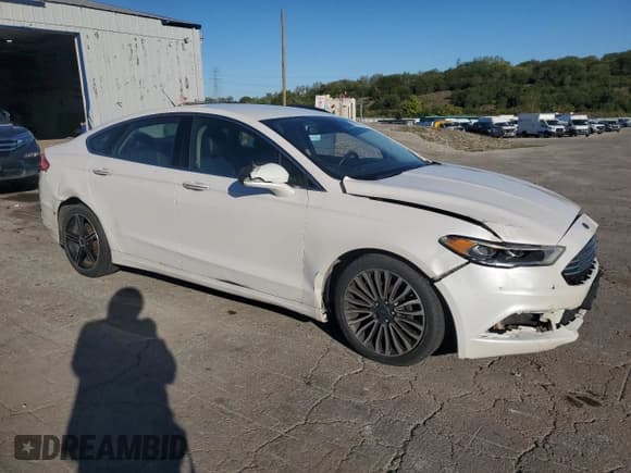 ✅ 2018 Ford Fusion Titanium • VIN: 3FA6P0D98JR112518 • Lot: 86076285. Wystawiony na Copart z przebiegiem 256 904 mil. Bezpłatny archiwum sprzedaży aukcyjnych z USA i szczegółowy raport historii pojazdu na DreamBid. Zdjęcie 4.