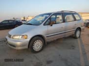 ✅ 1997 Honda Odyssey • VIN: JHMRA1842VC003732 • Lot: 86205204. Listed on Copart with 136,693 mi. Free auction sales archive from the USA and detailed vehicle history report at DreamBid. Image 1.