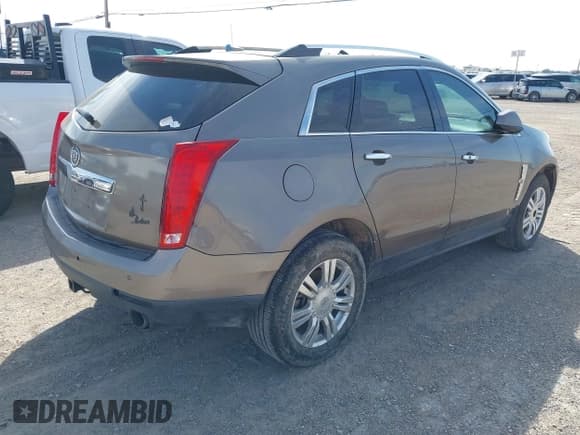 ✅ 2011 Cadillac SRX Luxury Collection • VIN: 3GYFNAEY8BS539052 • Lot: 43228121. Wystawiony na IAAI z przebiegiem 186 996 mil. Bezpłatny archiwum sprzedaży aukcyjnych z USA i szczegółowy raport historii pojazdu na DreamBid. Zdjęcie 4.