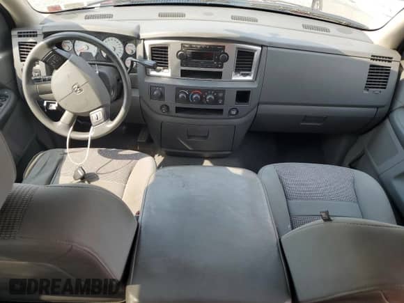 2007 Dodge 1500 SLT с VIN 1D7HU182X7S258131, выставлен на аукционе Copart как лот 66111134 с пробегом Не указан миль и Чистый • Clean title. История ставок и продаж доступна на DreamBid. Изображение 8.