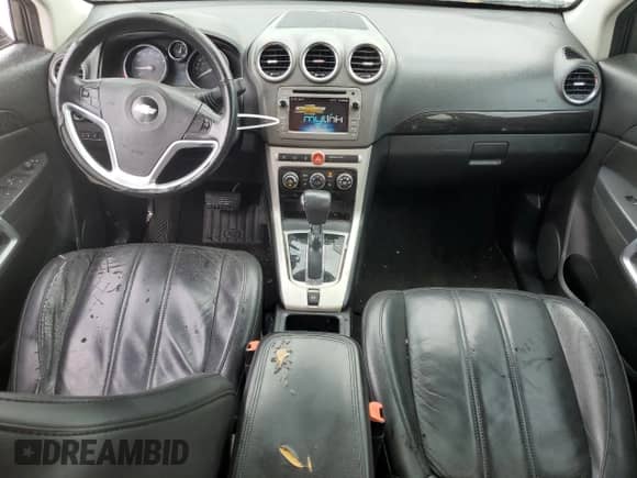 2014 Chevrolet Captiva Sport LT z VIN 3GNAL3EK8ES574053, wystawiony jako Copart lot #79318814 z przebiegiem 96 246 mil mil oraz Czysty tytuł • Clean title. Historia ofert i sprzedaży dostępna na DreamBid. Obrazek 8.